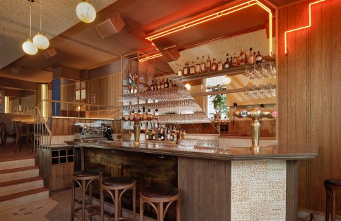 Studio Modijefsky has created a neon-lit new bar in Amsterdam