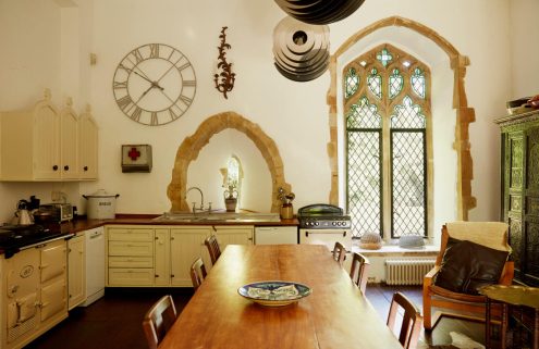 A furniture maker converted this 12th-century church into a family home