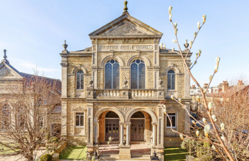 Converted chapel for sale in Harrogate has high ceilings and a living room pulpit